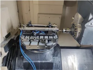 a) Use a probe to verify the repeatability of the part